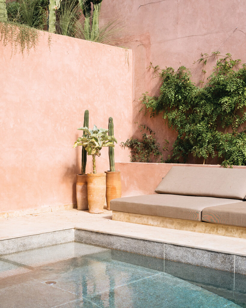 The corner of the swimming pool is adjacent to the infamous Jardin Majorelle, with the pool floor made from hand-poured grey terrazzo.