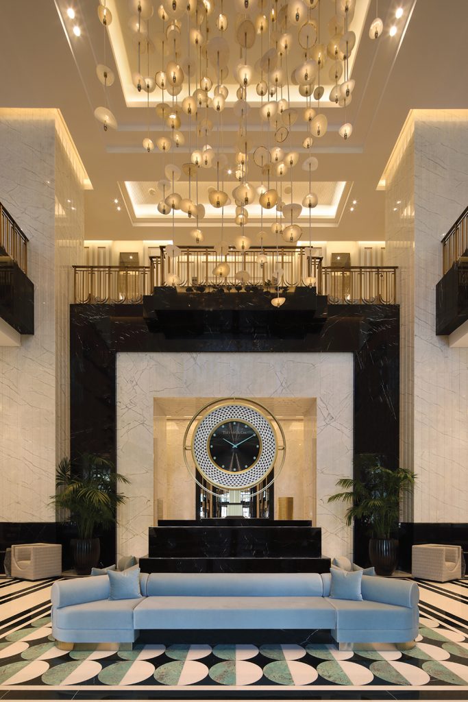 A Tiffany & Co. clock greets guests as they enter the hotel