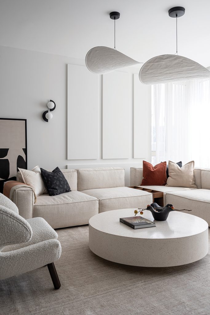 Trendy pieces with smooth curves and soft rounded edges bring harmony to the space (Dubai Apartment)