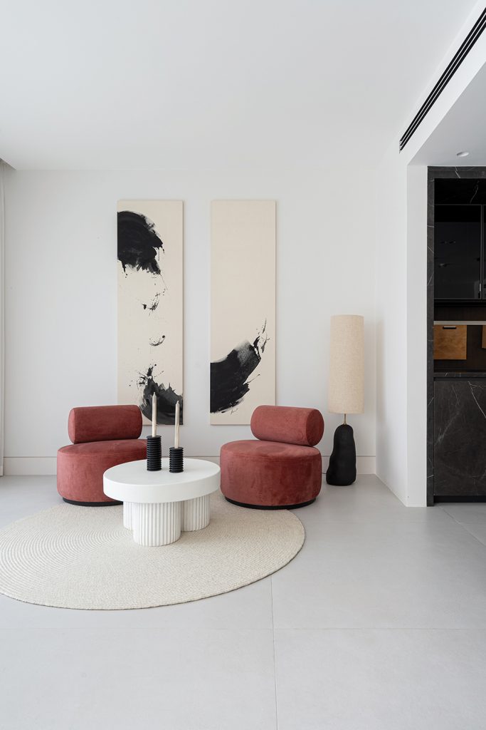 The design has a neutral background with accents of colour (Dubai Apartment)