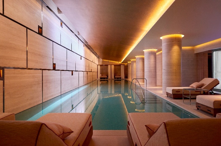 The indoor pool at The Emory with geometric designs that keep the space open and flexible