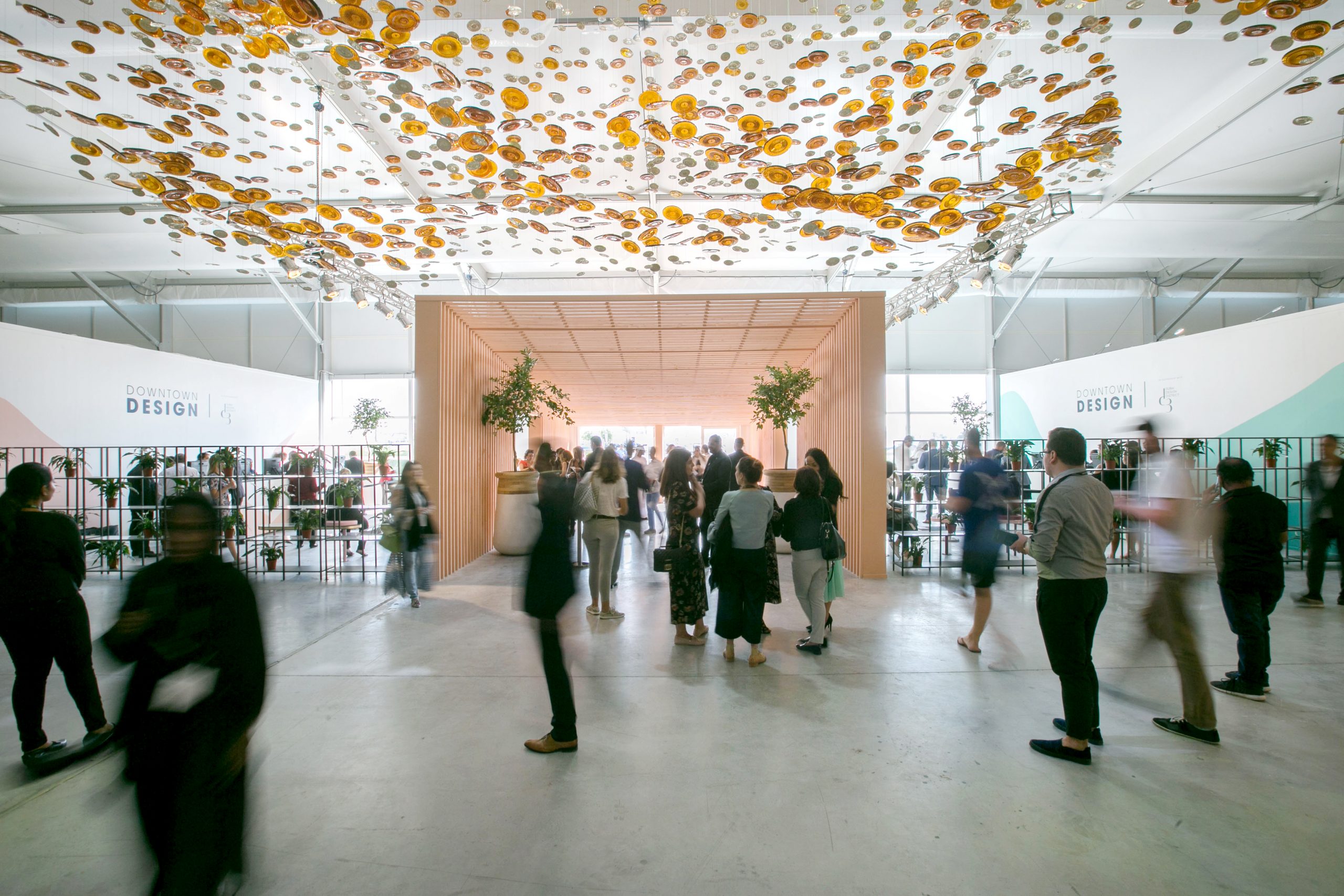 A group of people at Dubai Design Week, Editions