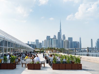 Dubai Design Week 2024 at d3 waterfront overlooking dubai skyline