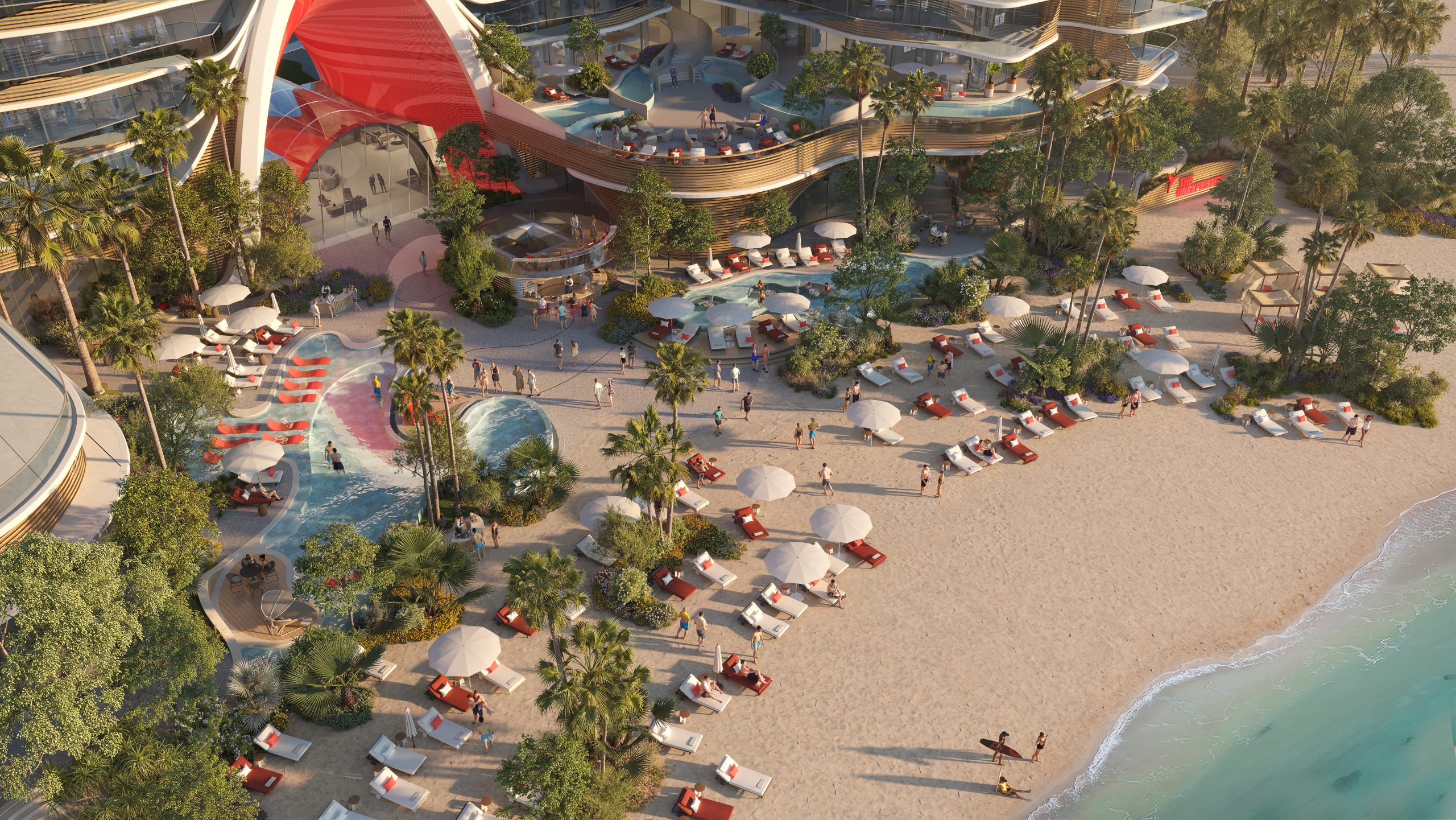 Aerial view of a beach with a pool and umbrellas