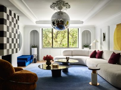 the 955 Fifth Avenue residence living room with a disco ball from the ceiling